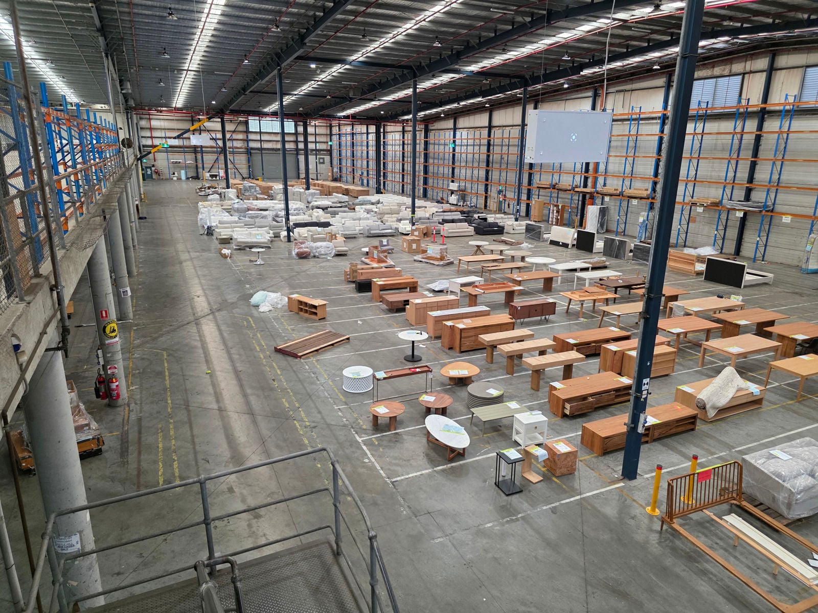 Warehouse interior with racking and stock